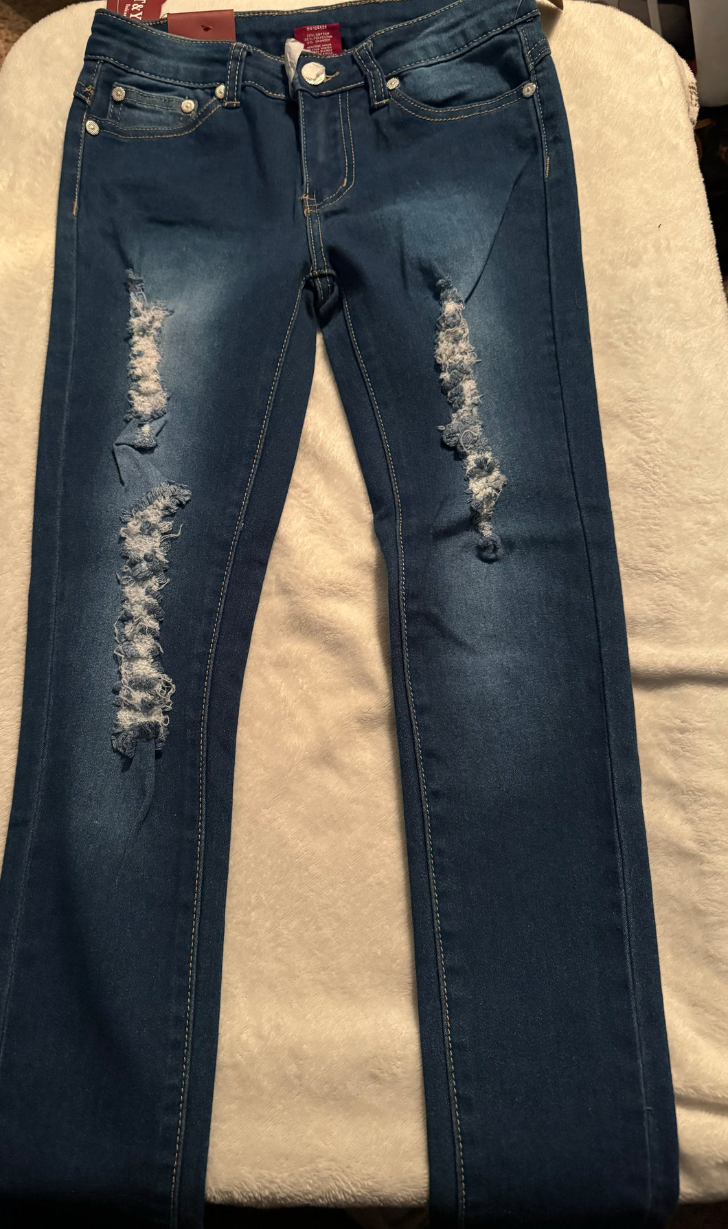 Stone wash distressed jeans